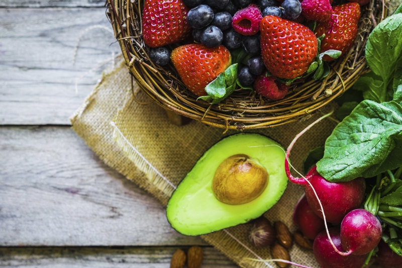 Fruits and vegetables on rustic background