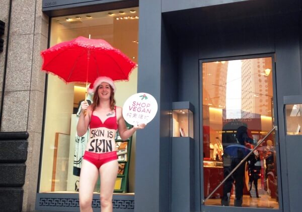 Activist Dresses in Sexy Ho-Ho-Holiday Outfit With ‘Skin Is Skin’ Message