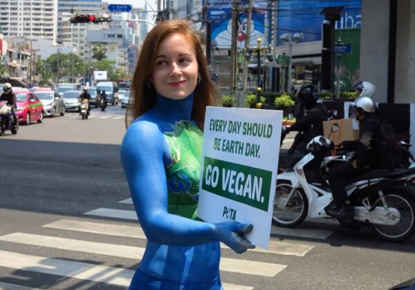 PHOTOS: Activist Bodypainted as ‘Mother Earth’ in Bangkok for Earth Day