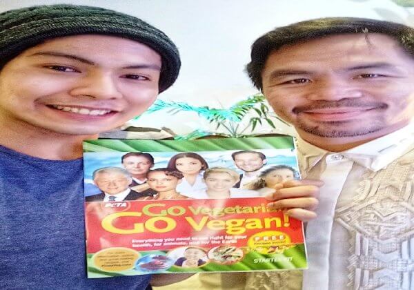PHOTOS: Manny Pacquiao Spotted Reading a Copy of PETA’s Vegan Starter Kit