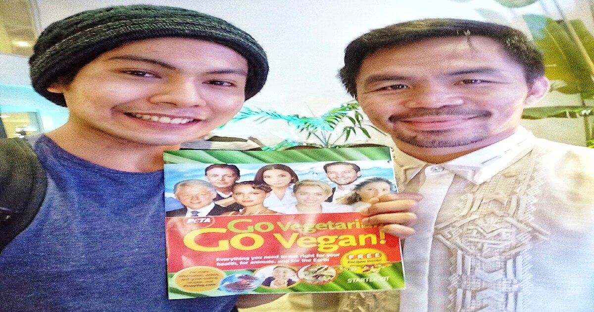 PHOTOS: Manny Pacquiao Spotted Reading a Copy of PETA’s Vegan Starter Kit