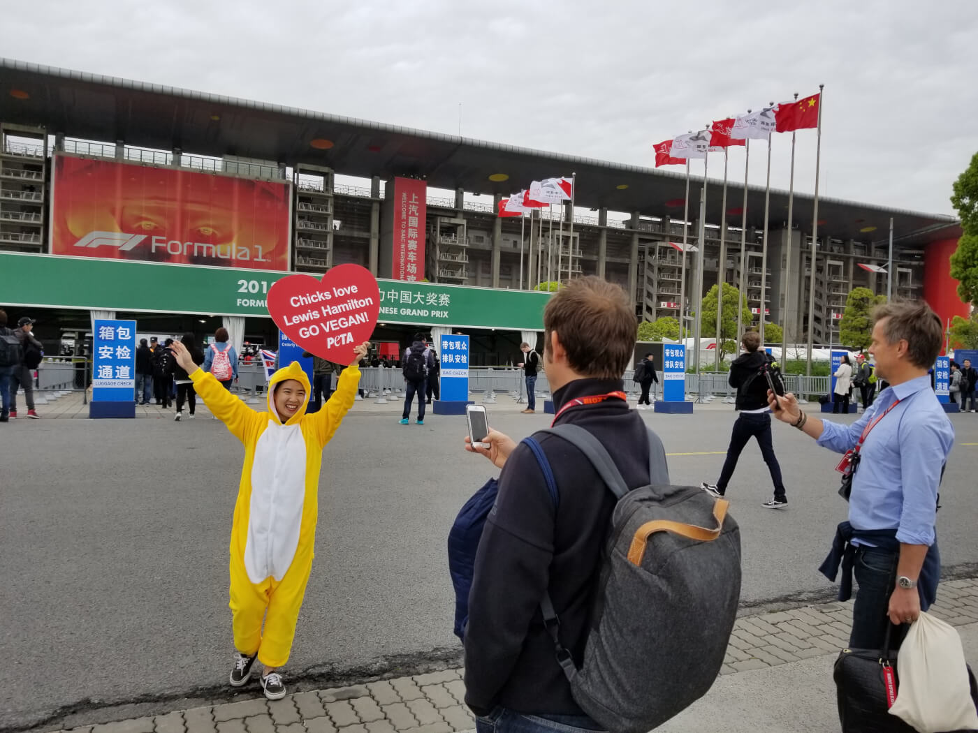 PHOTOS: Cute ‘Chick’ Cheers On Lewis Hamilton at the Formula 1 Chinese Grand Prix