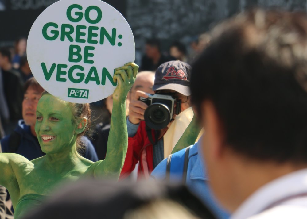 PHOTOS Painted Green, PETA Activists in Tokyo Fight Climate Change on