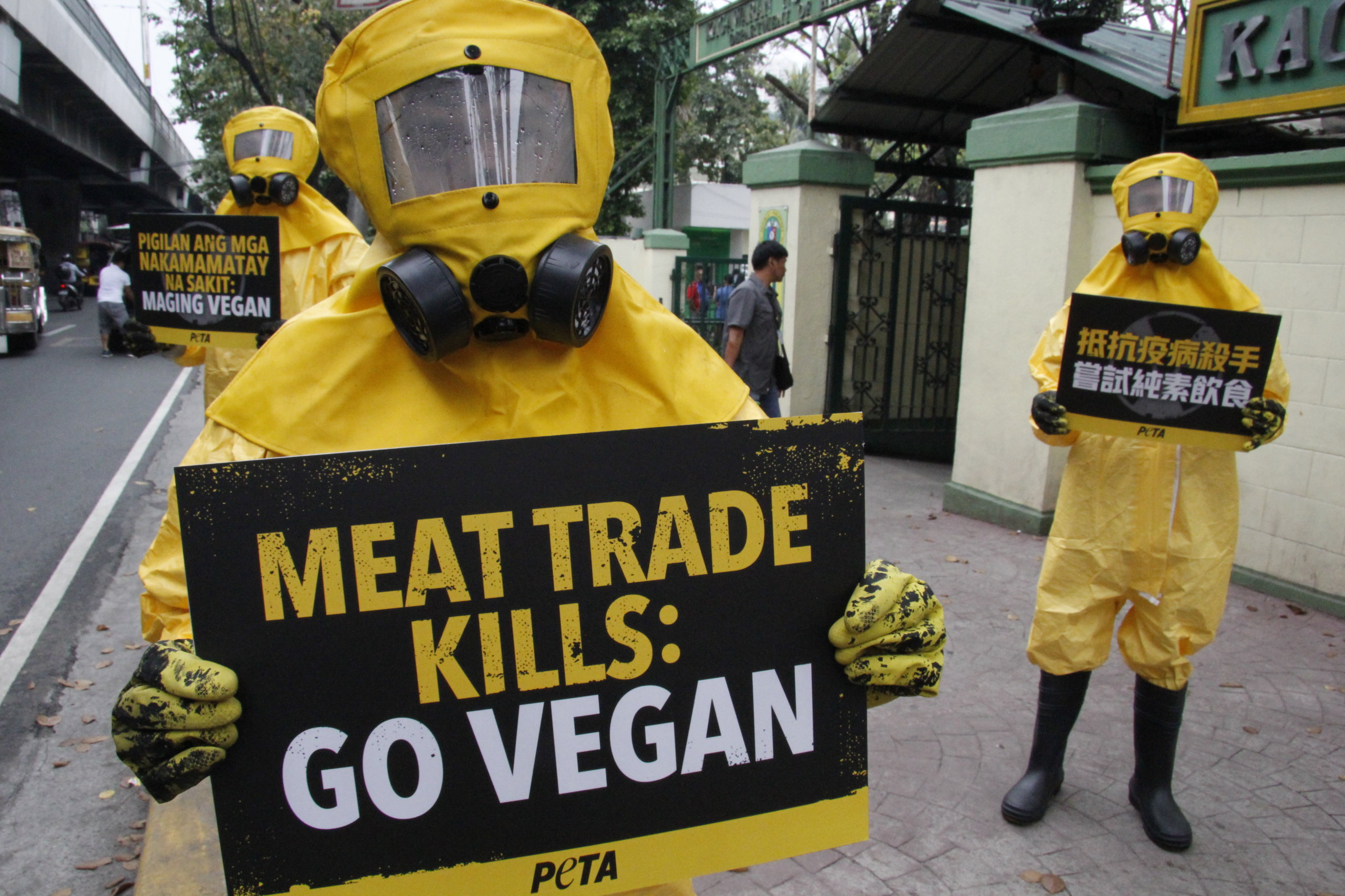 Photos: PETA Members Dressed Hazmat Suits Blame Meat Industry for Coronavirus